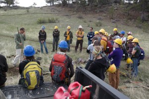 Paul Gritten teaching the crews about his IMBA standards before they head out for the trail