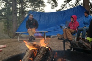 Ryan telling the group a story about a pig around the campfire