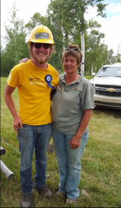 Jordan receives a cake from Sandy 